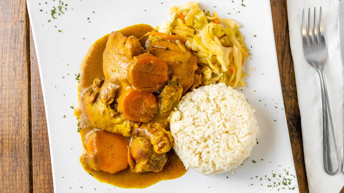 Order Curry Chicken food online from The Island Spot store, Dallas on bringmethat.com