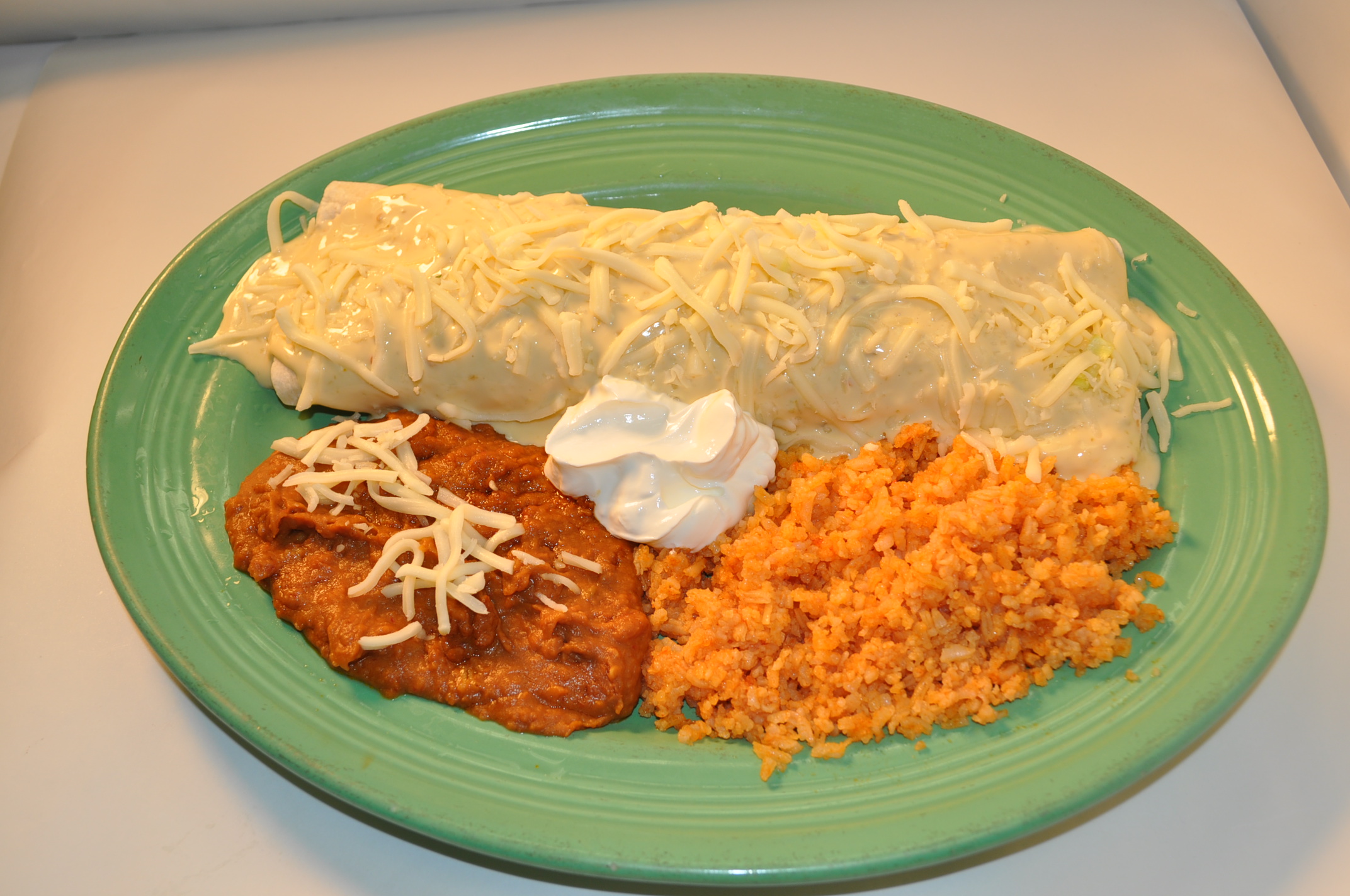 Order Mucho Grande Burrito food online from Good Tequilas Mexican Grill store, Glendale Heights on bringmethat.com