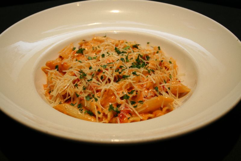 Order Vodka Pasta with Blackened Chicken (Dinner) food online from The Clubhouse store, Oak Brook on bringmethat.com