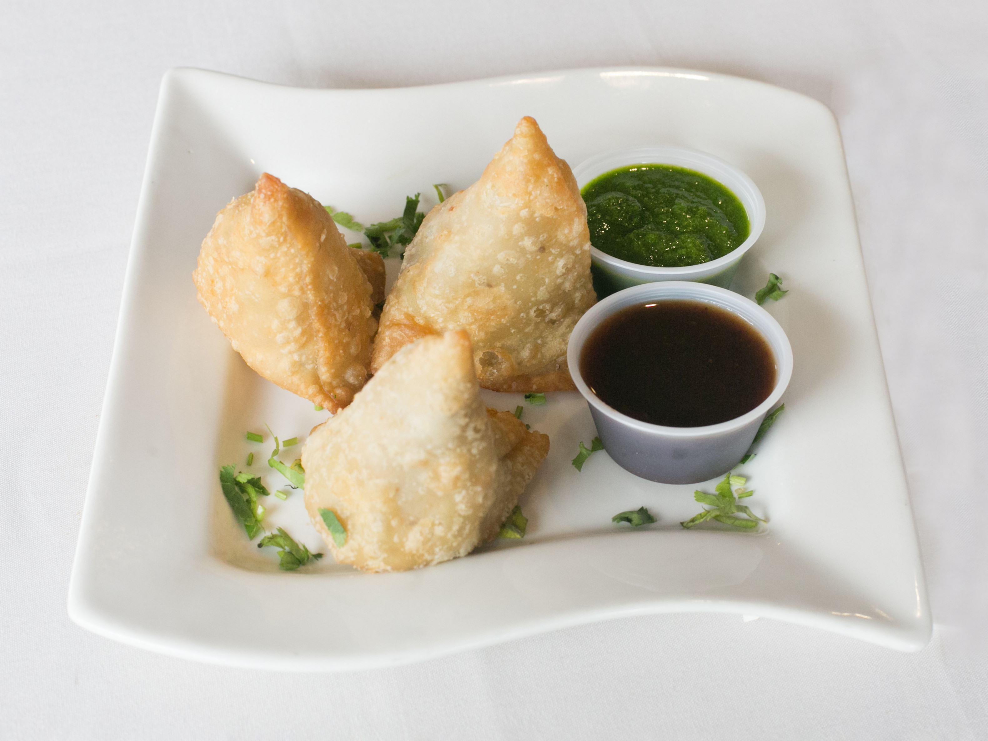 Order 2 Vegetable Samosas food online from Zaika Indian Cuisine store, North Haven on bringmethat.com