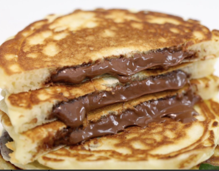 Order Nutella Pancakes food online from Taste Cafe & Grill store, Ozone Park on bringmethat.com