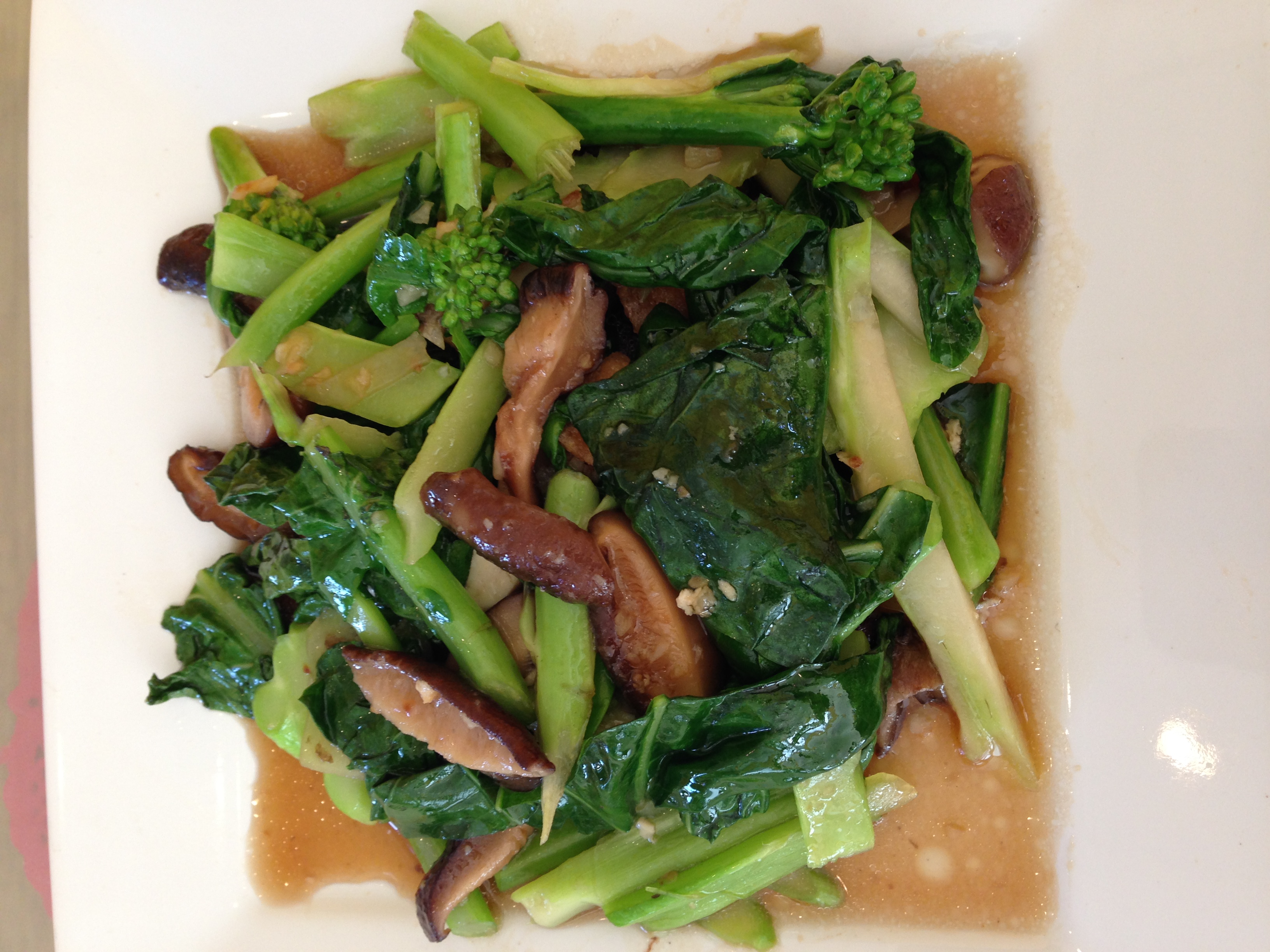 Order Stir fried Chinese broccoli and mushrooms food online from Thai Apsara store, Beaverton on bringmethat.com