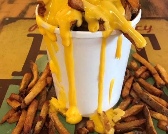 Order Bucket "O" Fries with Cheese food online from Devil Dawgs Gold Coast store, Chicago on bringmethat.com