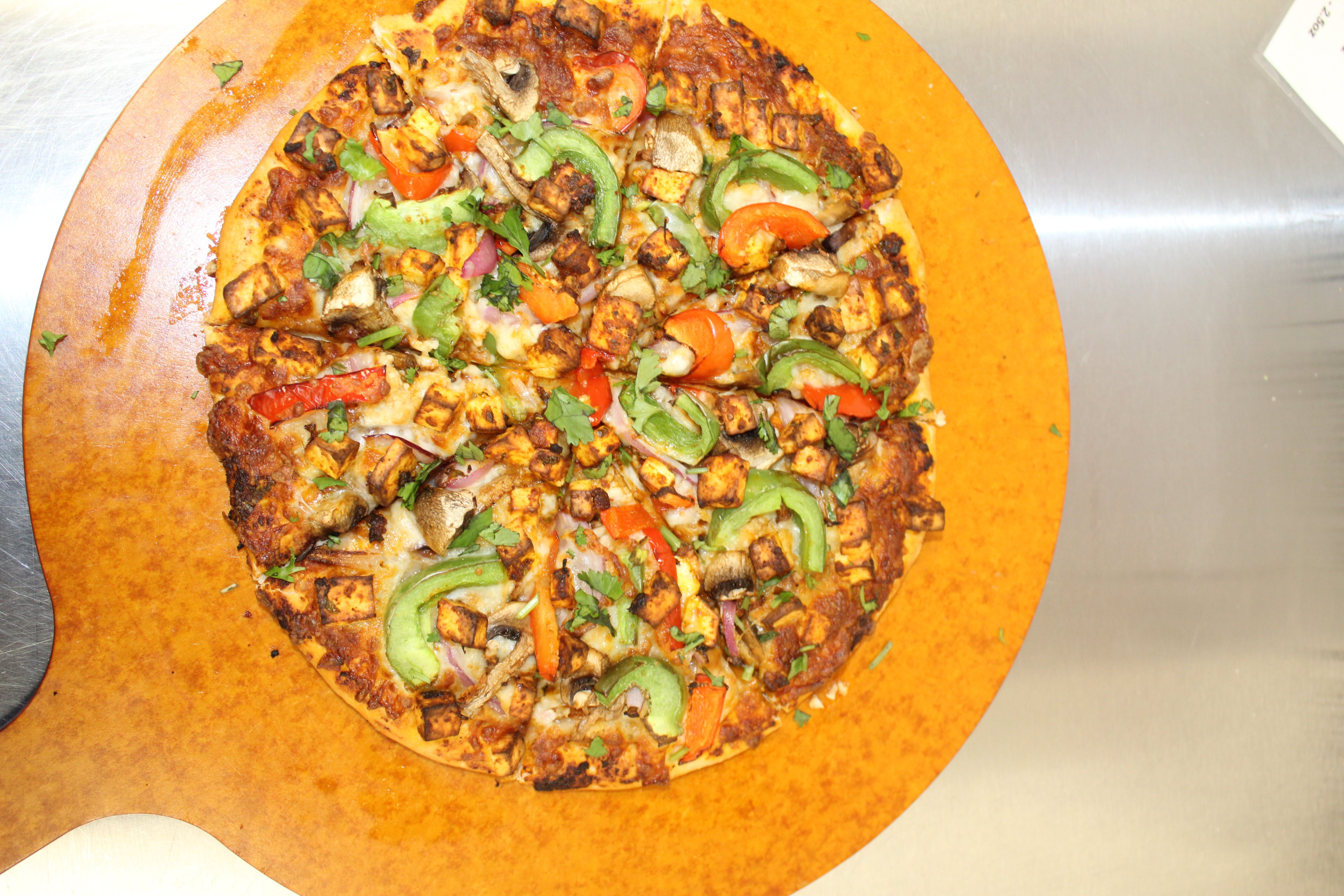 Order Tandoori  Pizza(regular) - Personal  7'' food online from Pizzeria Halt store, Modesto on bringmethat.com