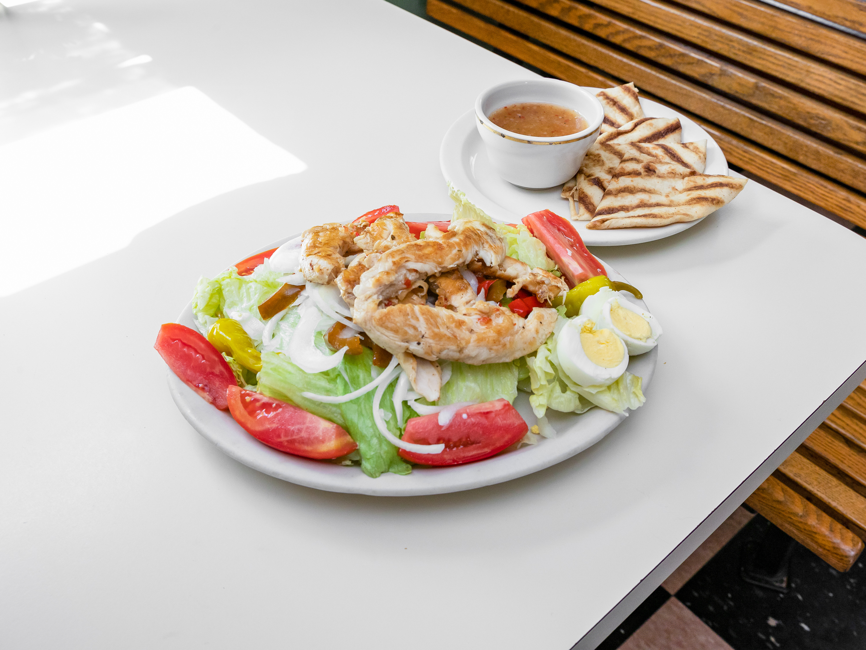 Order Chicken Caesar Salad food online from Sunshine Cafe store, Cathedral City on bringmethat.com