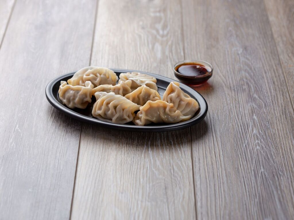 Order 8a. 8 Steam Dumplings food online from China Garden store, Windsor Mill on bringmethat.com