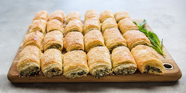 Order Spinach&Feta Rolls food online from Pizza Station store, Bellevue on bringmethat.com