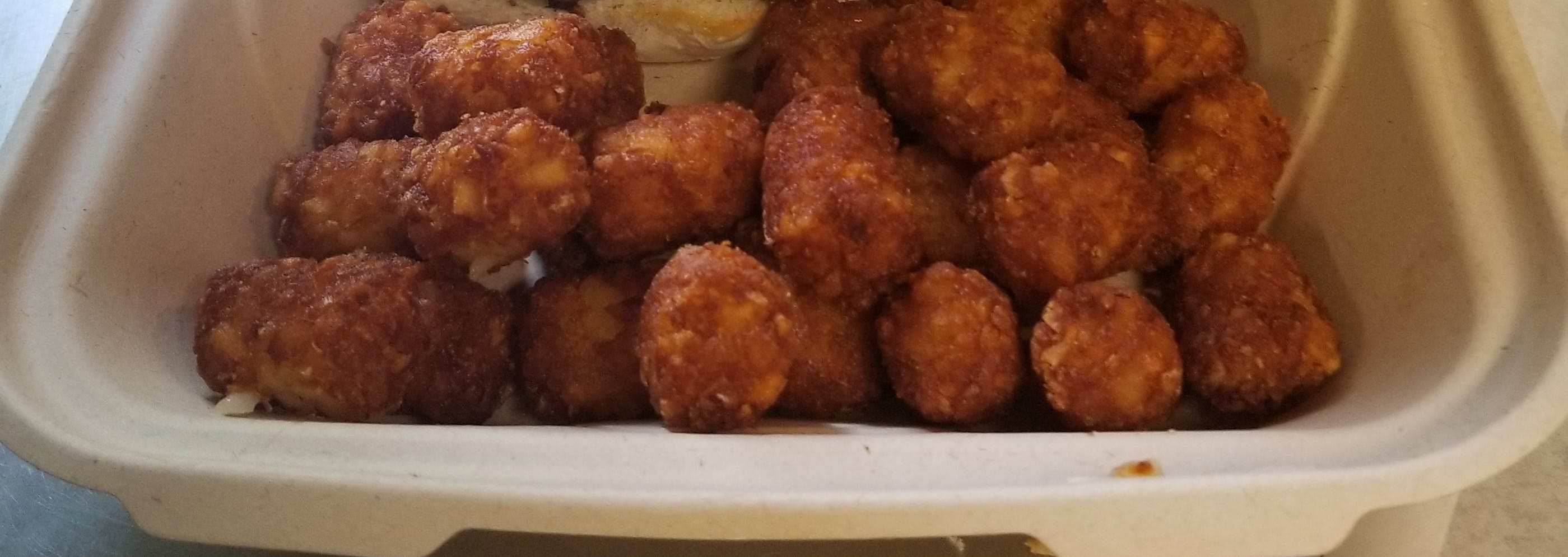 Order Tator Tots - Small food online from Novotny's Groceries & Pizza store, Worthington on bringmethat.com