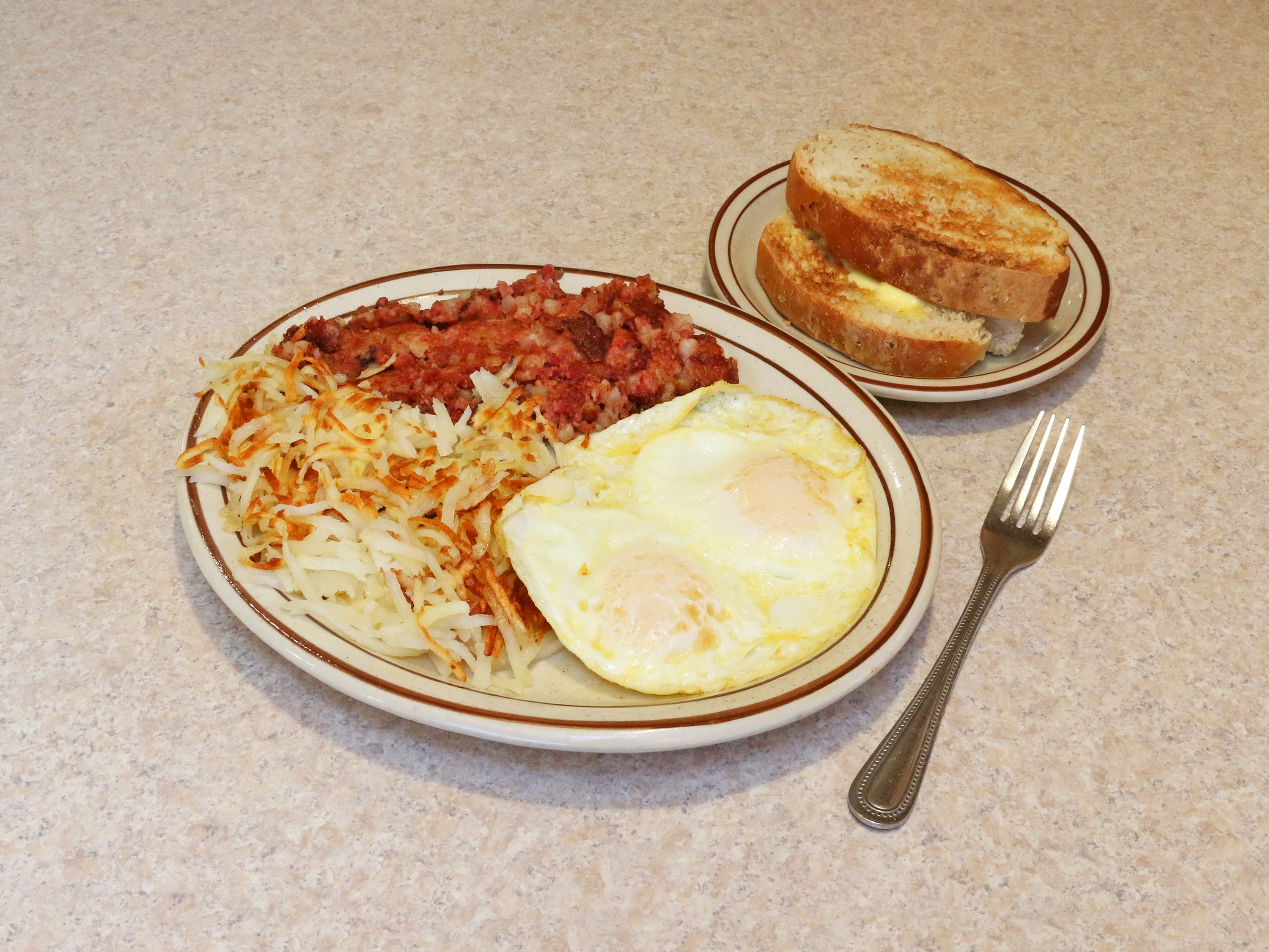 Order 2 Eggs with Corned Beef Hash food online from Papa G store, Huntley on bringmethat.com