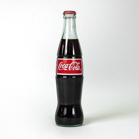 Order Mexican Coke (bottle) food online from Freshly Baked store, Oakland on bringmethat.com