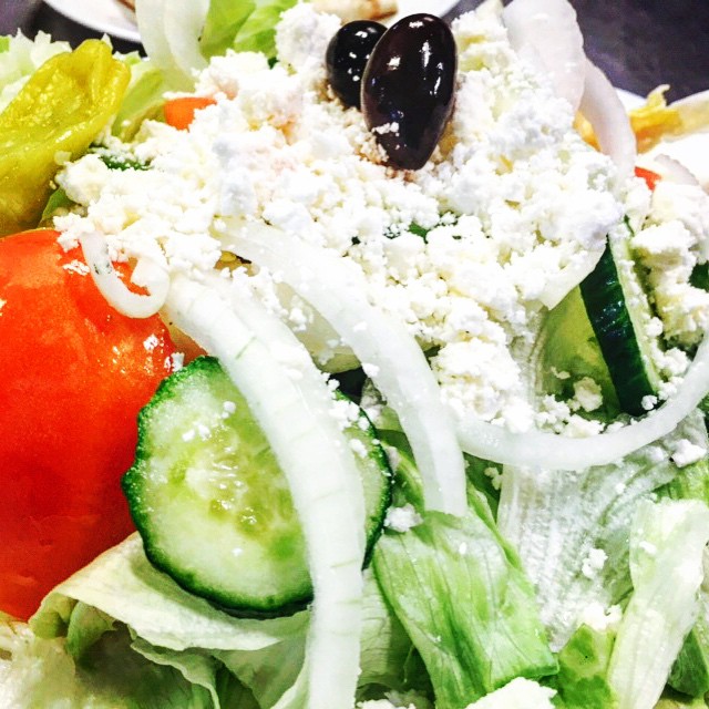 Order Greek Salad food online from Primavera Pizza store, Matthews on bringmethat.com