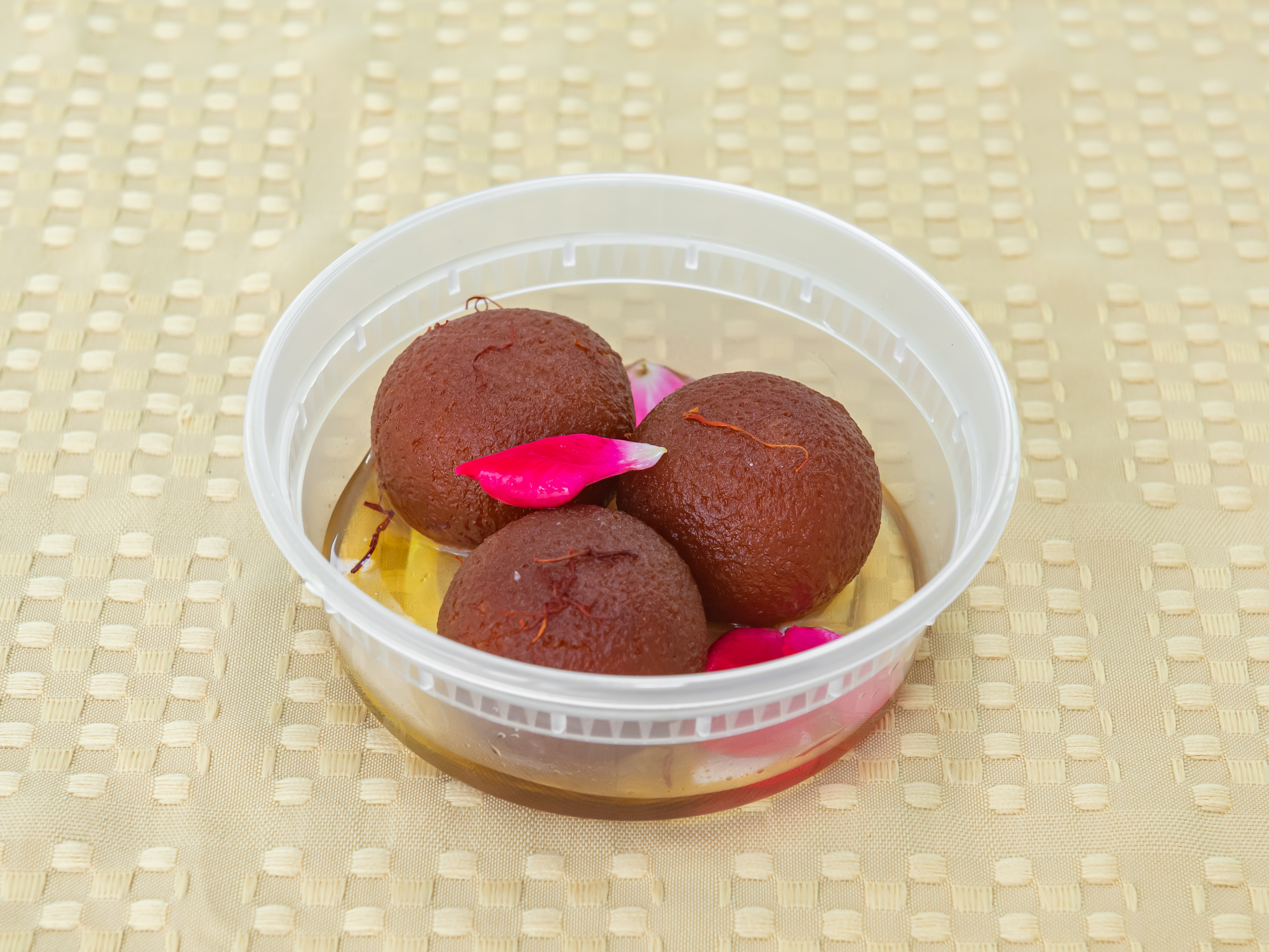 Order Gulab Jamun (1 piece) food online from Chatpatti Chaat store, Austin on bringmethat.com