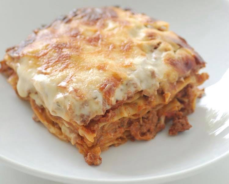 Order Baked Lasagna - Entree food online from Bonbino's Pizza store, Oceanside on bringmethat.com