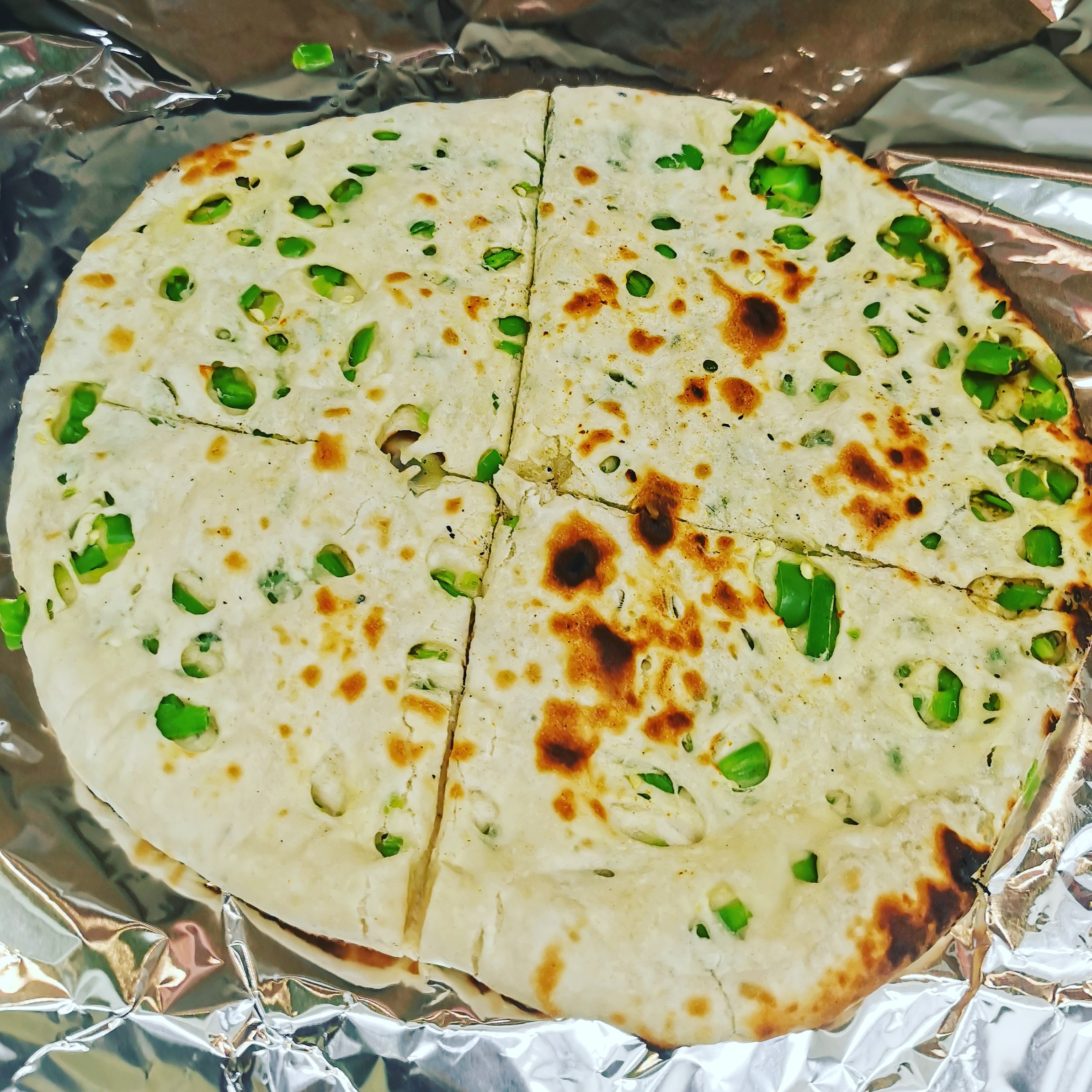Order Chili Naan food online from Indimex Eats Indian Restaurant store, Los Angeles on bringmethat.com