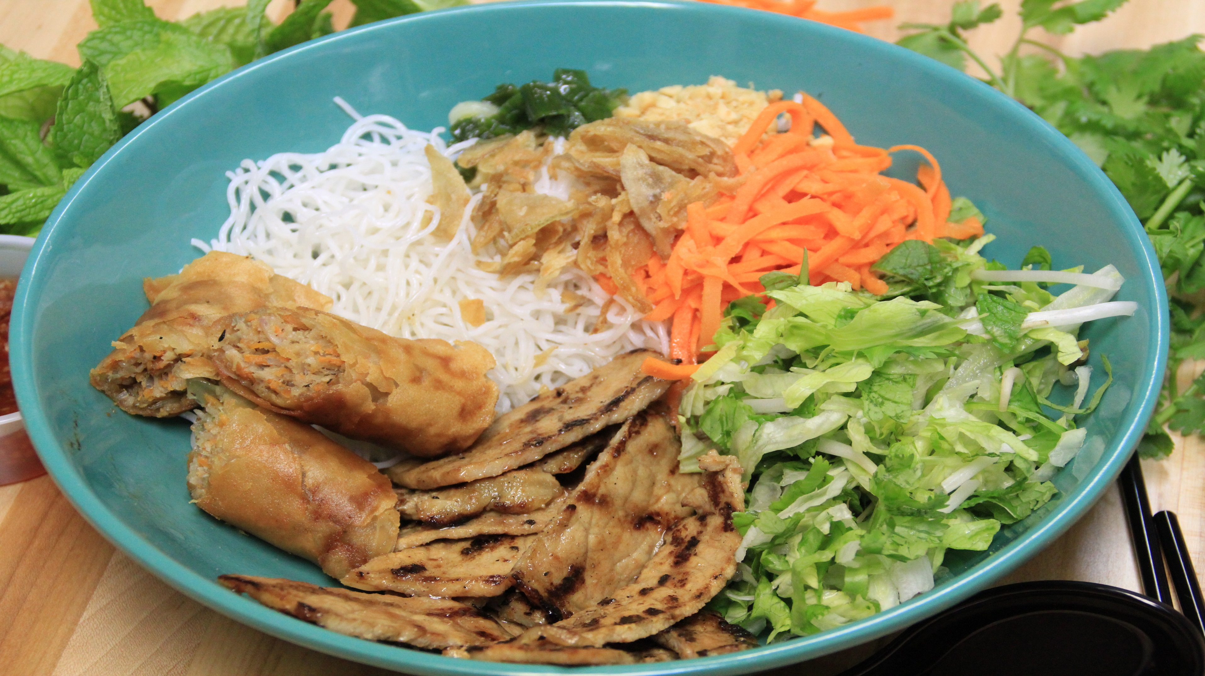 Order 93 - Grilled Pork and Spring Roll Vermicelli food online from Pho Street store, Philadelphia on bringmethat.com