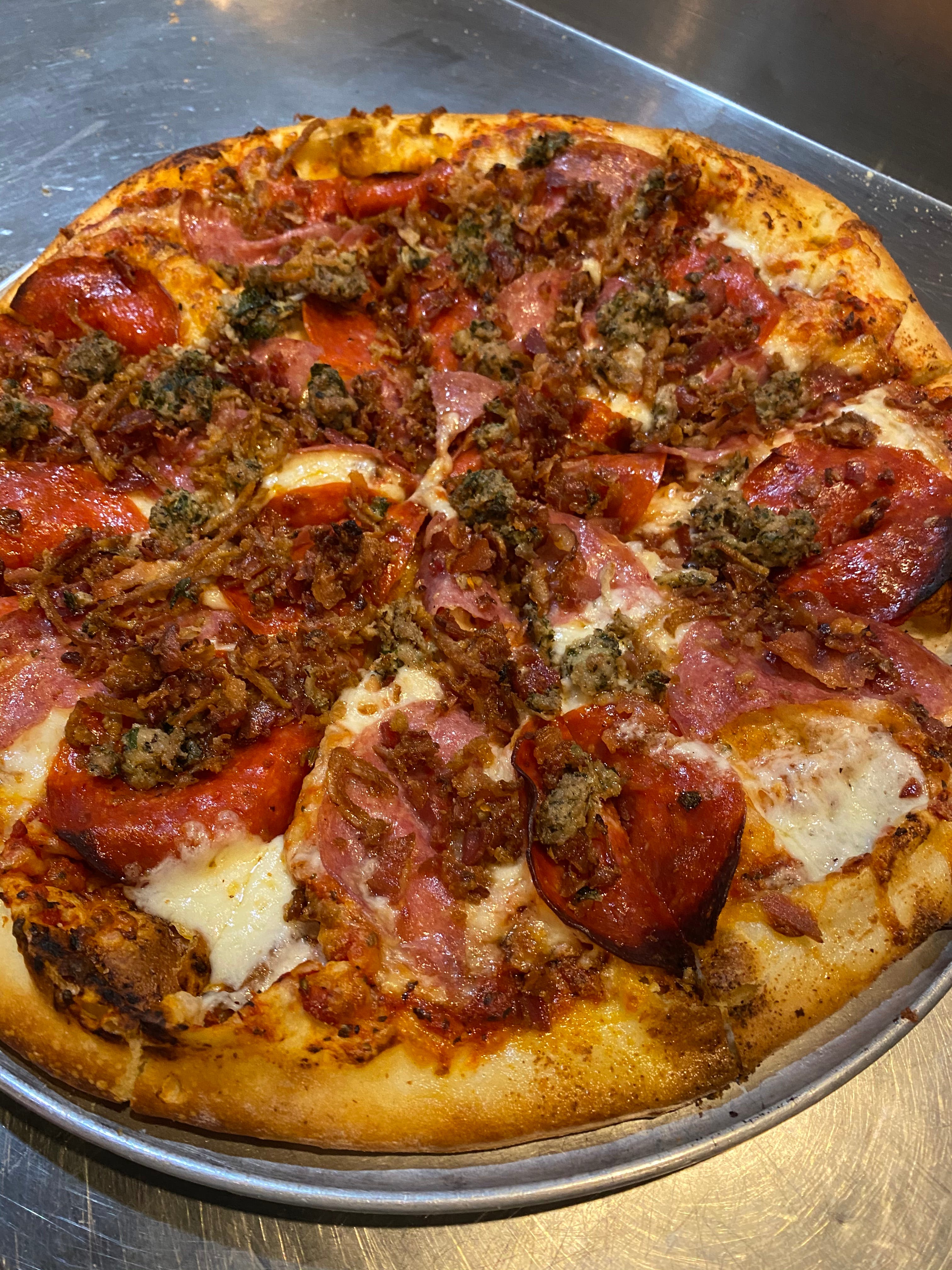 Order Meat Lovers Pizza - 16" food online from Corner Slice store, Steamboat Springs on bringmethat.com