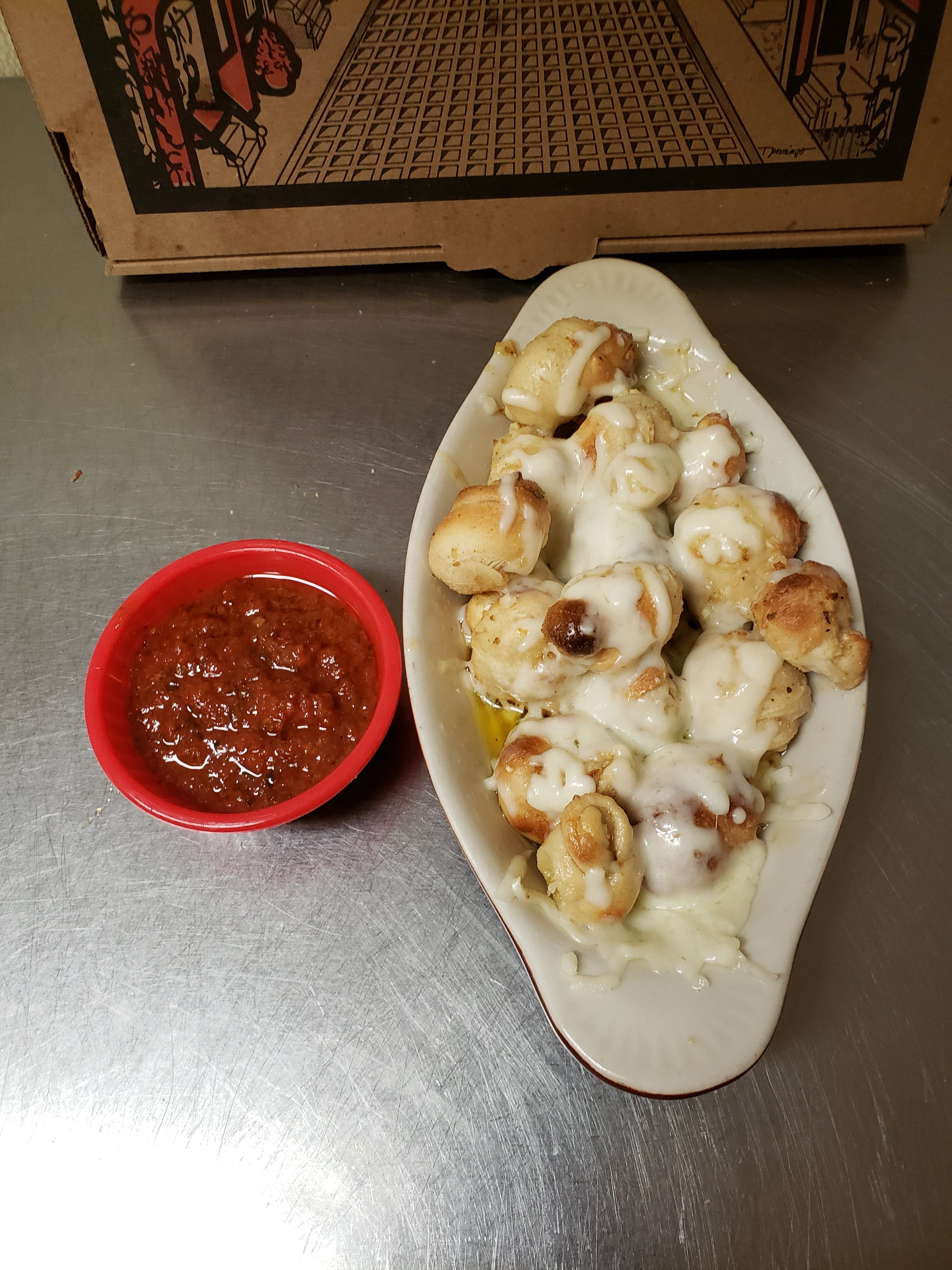Order Garlic Knots with Cheese - Side Orders food online from Aly's Family Italian Restaurant store, Christiansburg on bringmethat.com
