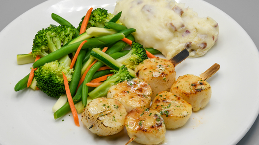Order Sea Scallops food online from Mitchell's Fish Market store, Livonia on bringmethat.com