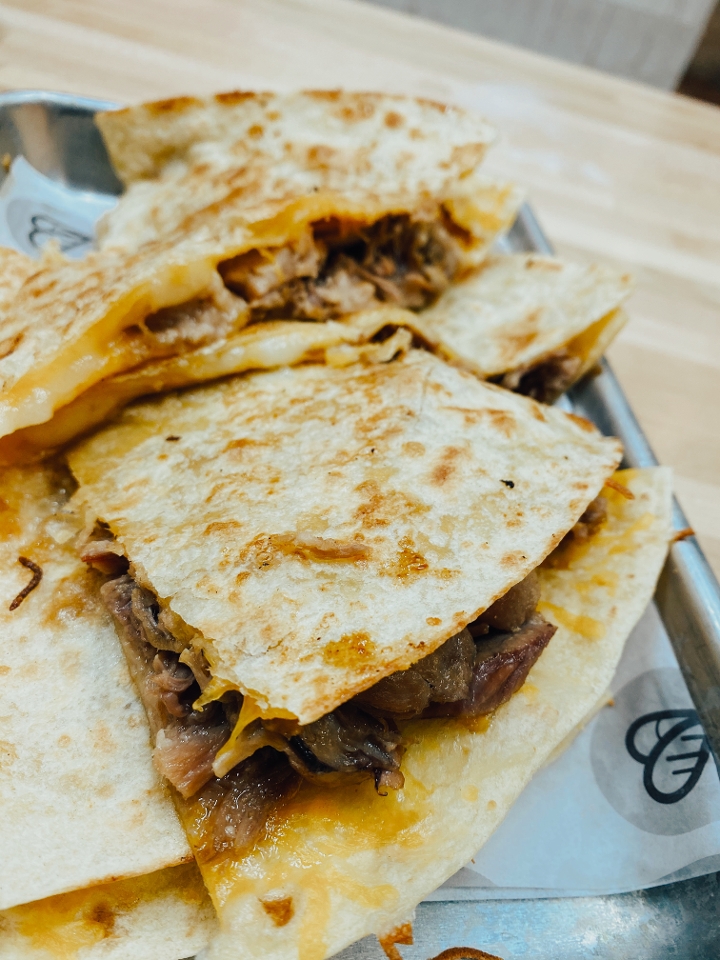 Order Carnitas American Quesadilla - Limited Time Only food online from Taquiero Taco store, Irvine on bringmethat.com
