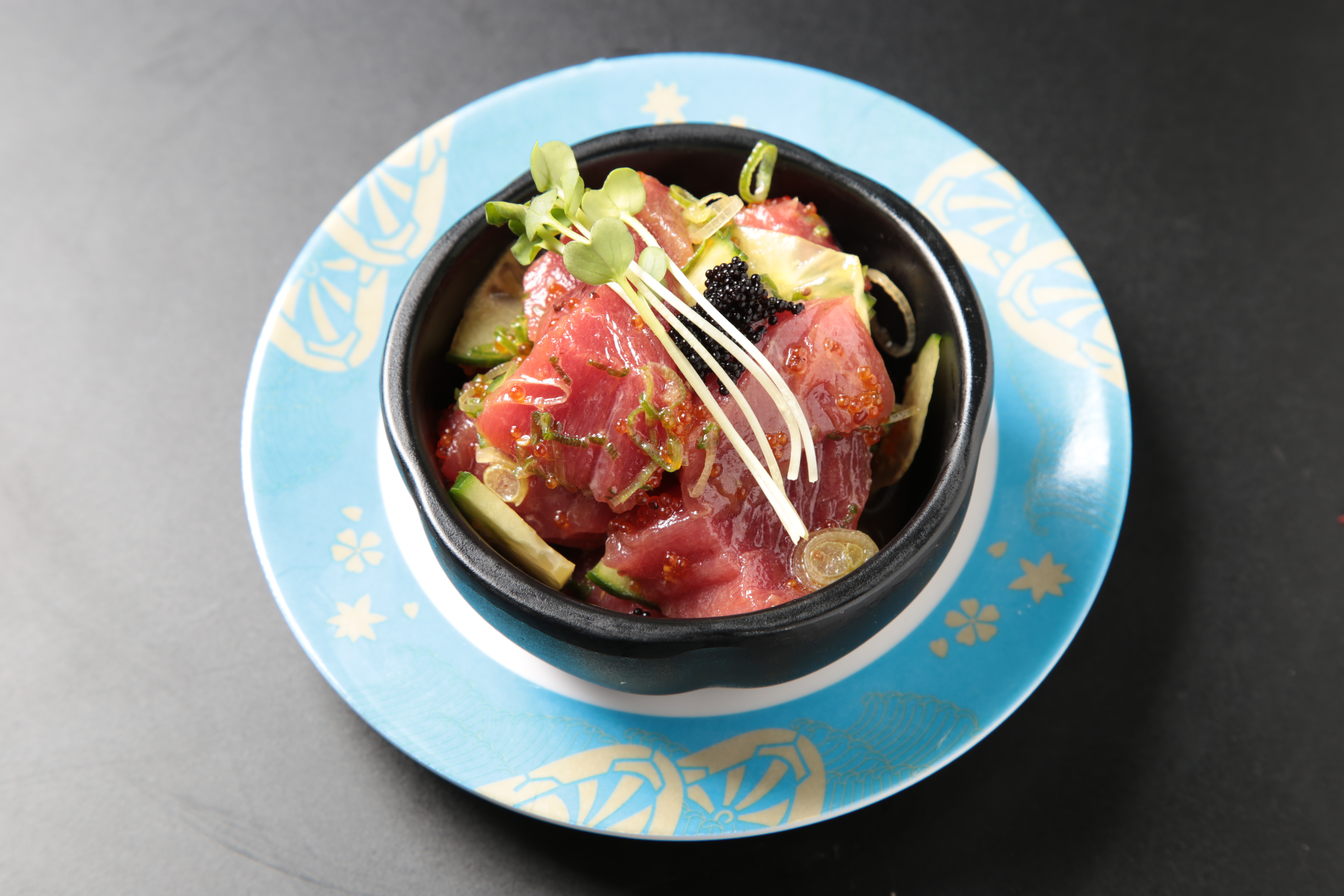 Order Tuna Poke food online from Izumi Revolving Sushi store, Daly City on bringmethat.com