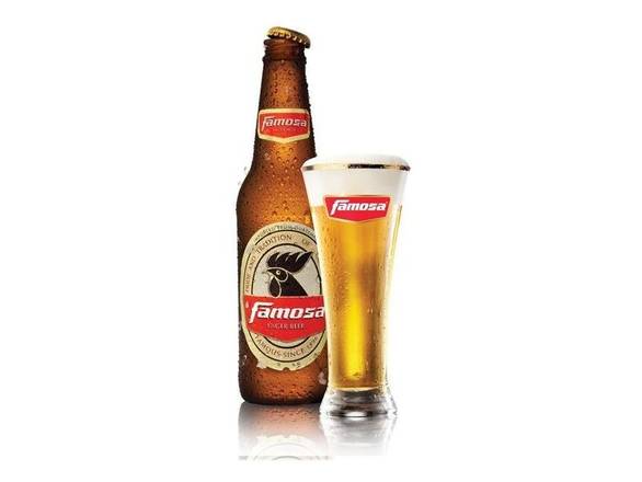 Order Central Beer Famosa - 6x 12oz Cans food online from Liquor Cabinet store, Houston on bringmethat.com