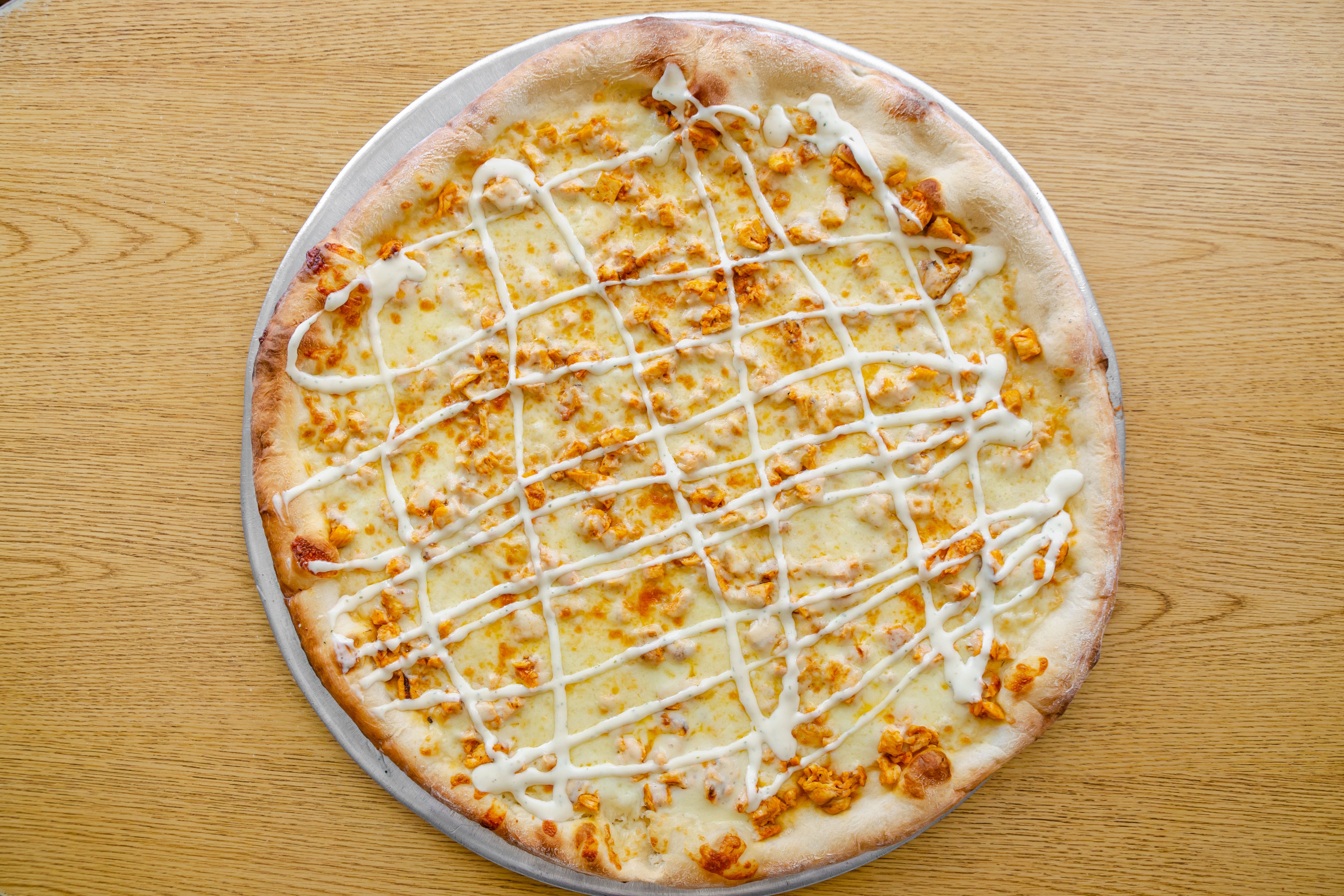 Order Round Buffalo Chicken Pizza - Large 18'' (8 Slices) food online from New Pizza On The Block store, West New York on bringmethat.com