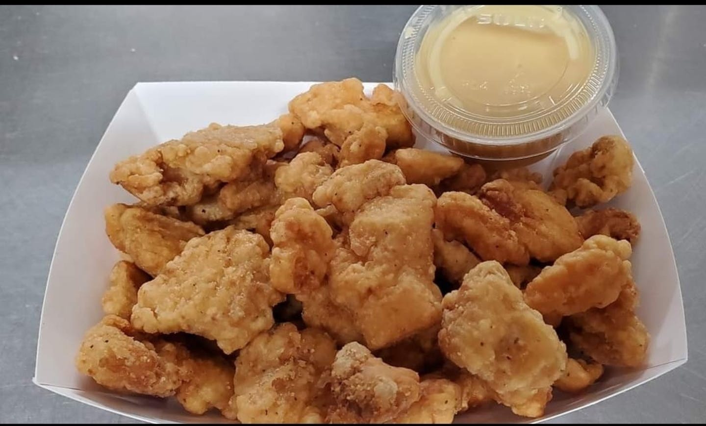 Order Boneless Chicken Wings - 1/2 lb. food online from Northside Pizza store, Hastings on bringmethat.com