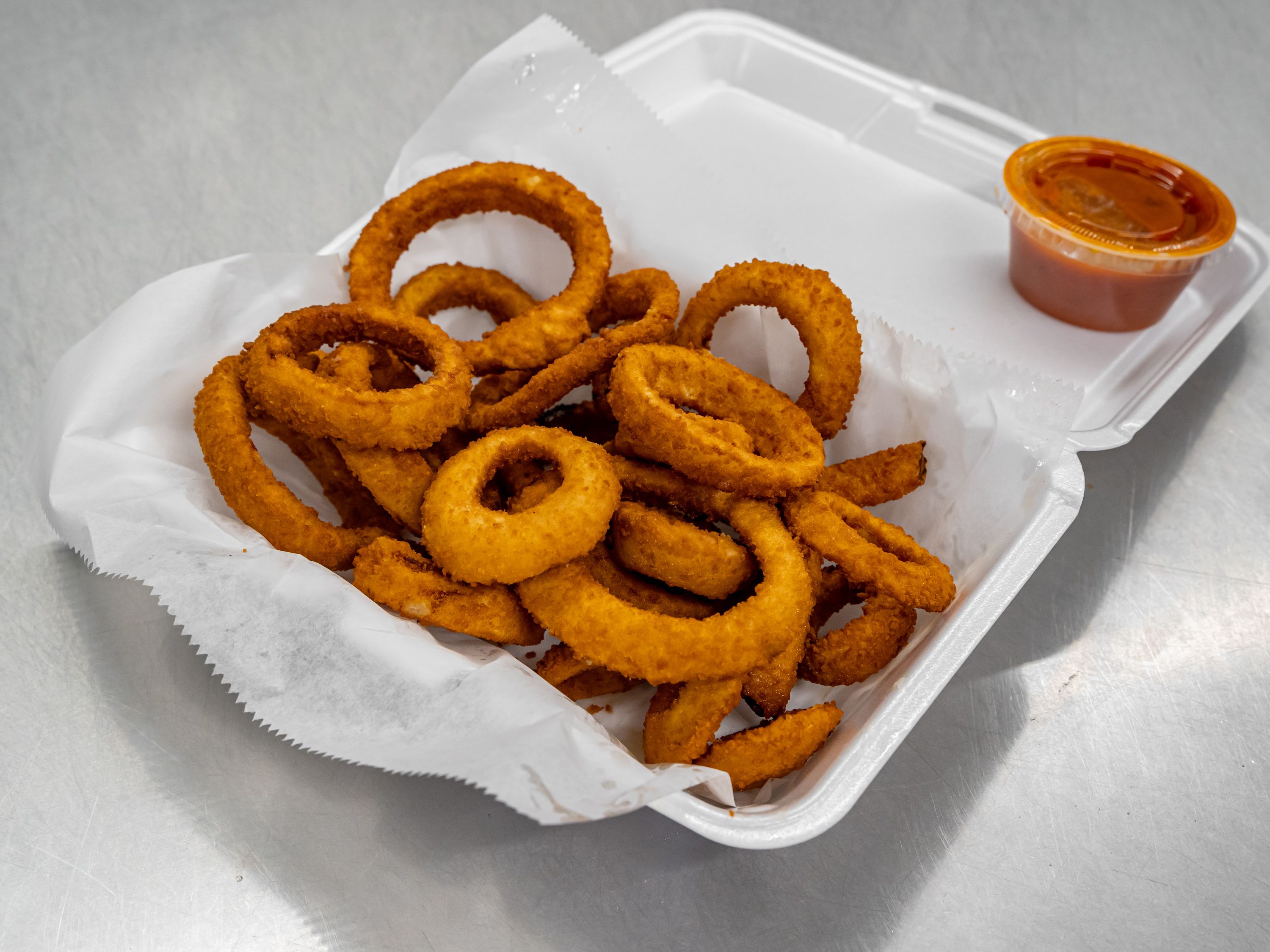 Order Onion Rings food online from Uncle Tomy's Pizza & Wings store, Philadelphia on bringmethat.com