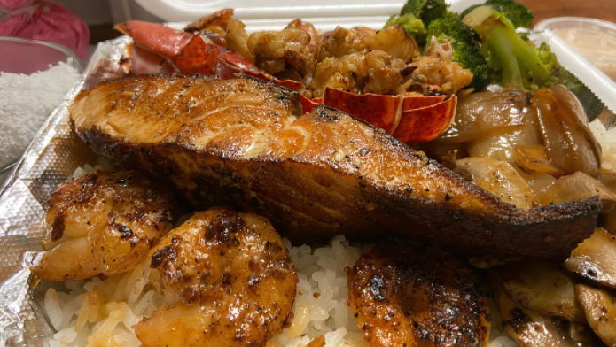 Order 12. Char-Grilled Salmon food online from Yoshi Hibachi Grille store, Detroit on bringmethat.com
