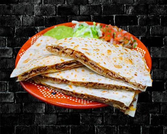 Order Carnitas Quesadilla food online from RIVAS MEXICAN GRILL store, Fort Mohave on bringmethat.com