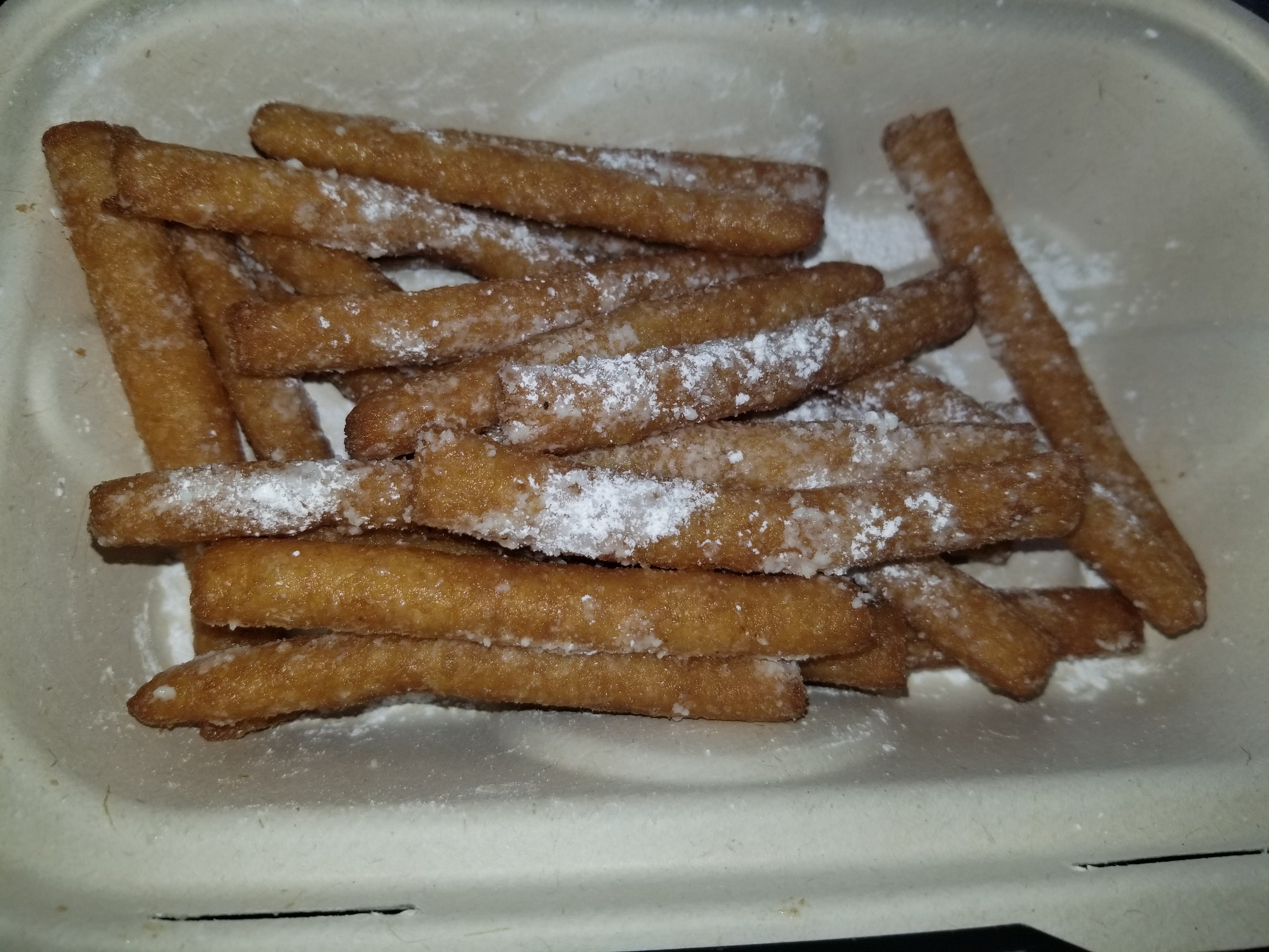 Order Funnel Cake Fries - Dessert food online from Novotny's Groceries & Pizza store, Worthington on bringmethat.com