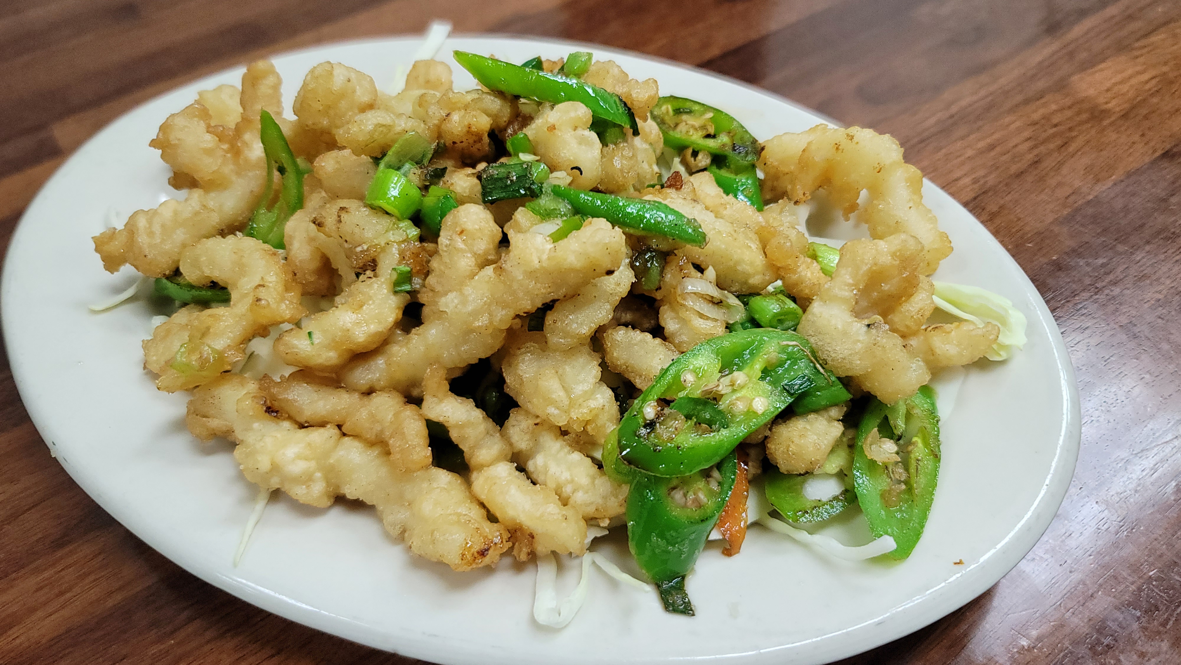 Order Calamari Deep Fried With Spiced Salt food online from China Cafe store, Austin on bringmethat.com