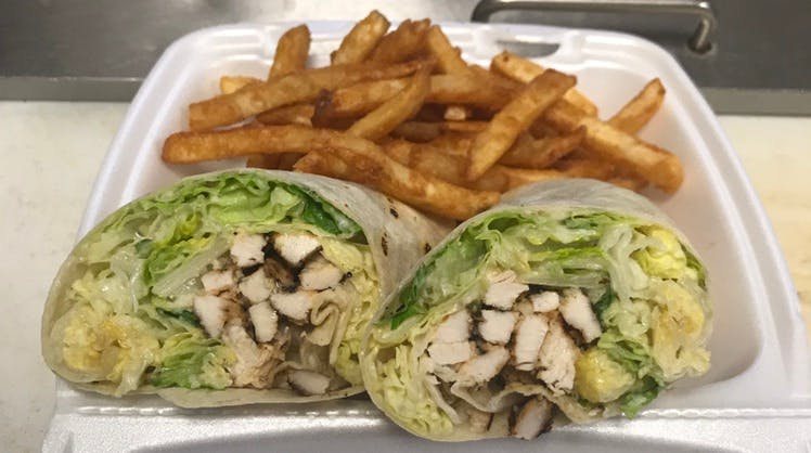 Order 1. Grilled Chicken Caesar Wrap - Wrap food online from Davila's Pizza & Restaurant store, Hackettstown on bringmethat.com