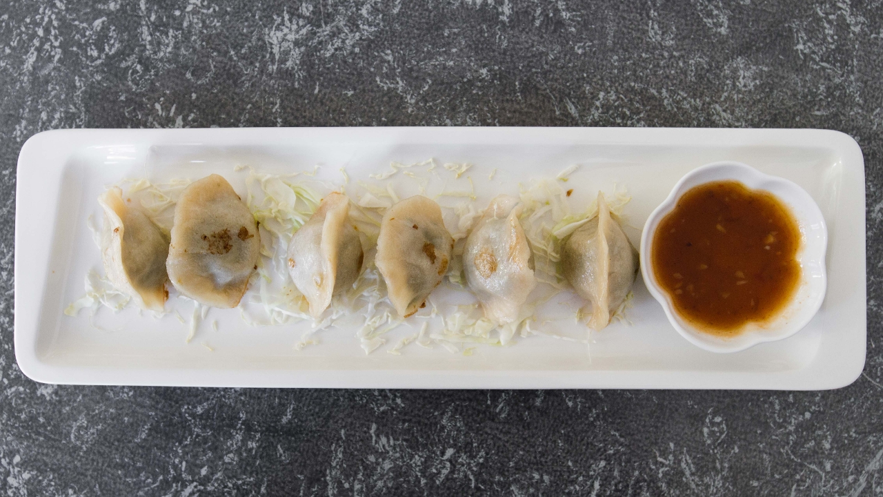 Order Pot Stickers - Chicken (5pcs) food online from Inle Burmese Cuisine store, San Francisco on bringmethat.com