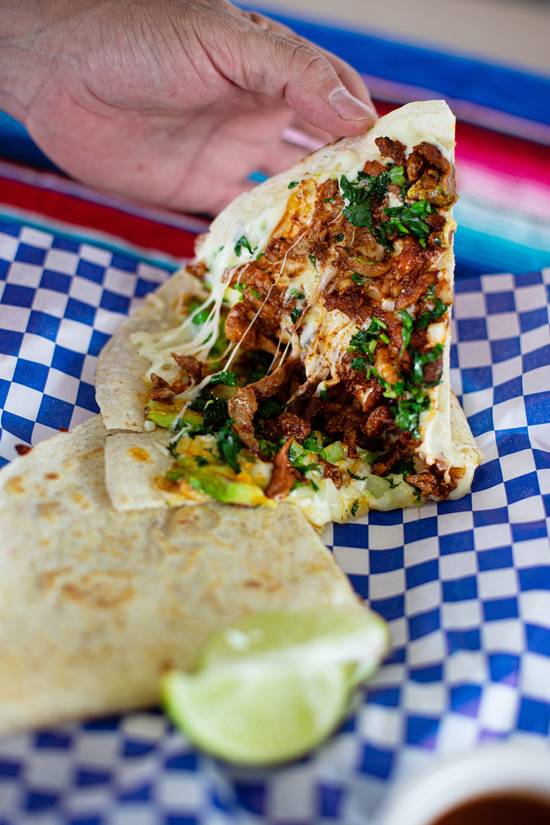 Order Giant Quesadilla (1) food online from Tacos El Regio store, San Antonio on bringmethat.com