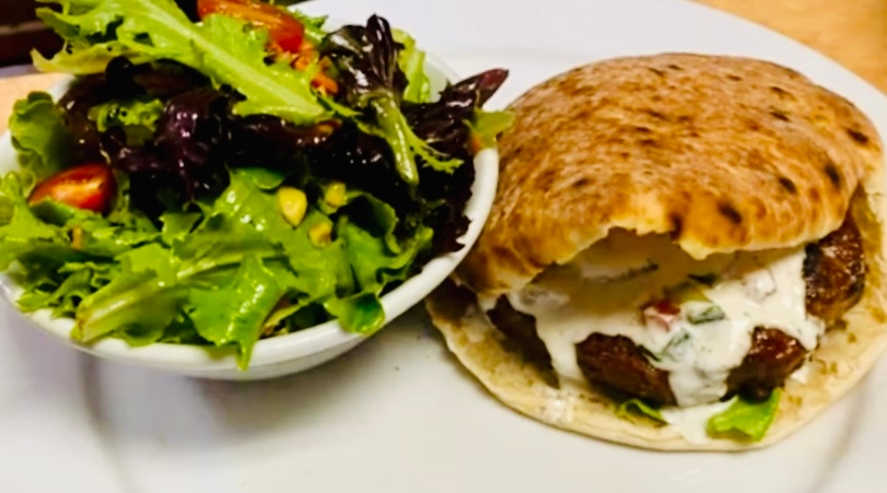 Order Mediterranean Lamb Burger food online from Busboys and Poets store, Washington on bringmethat.com