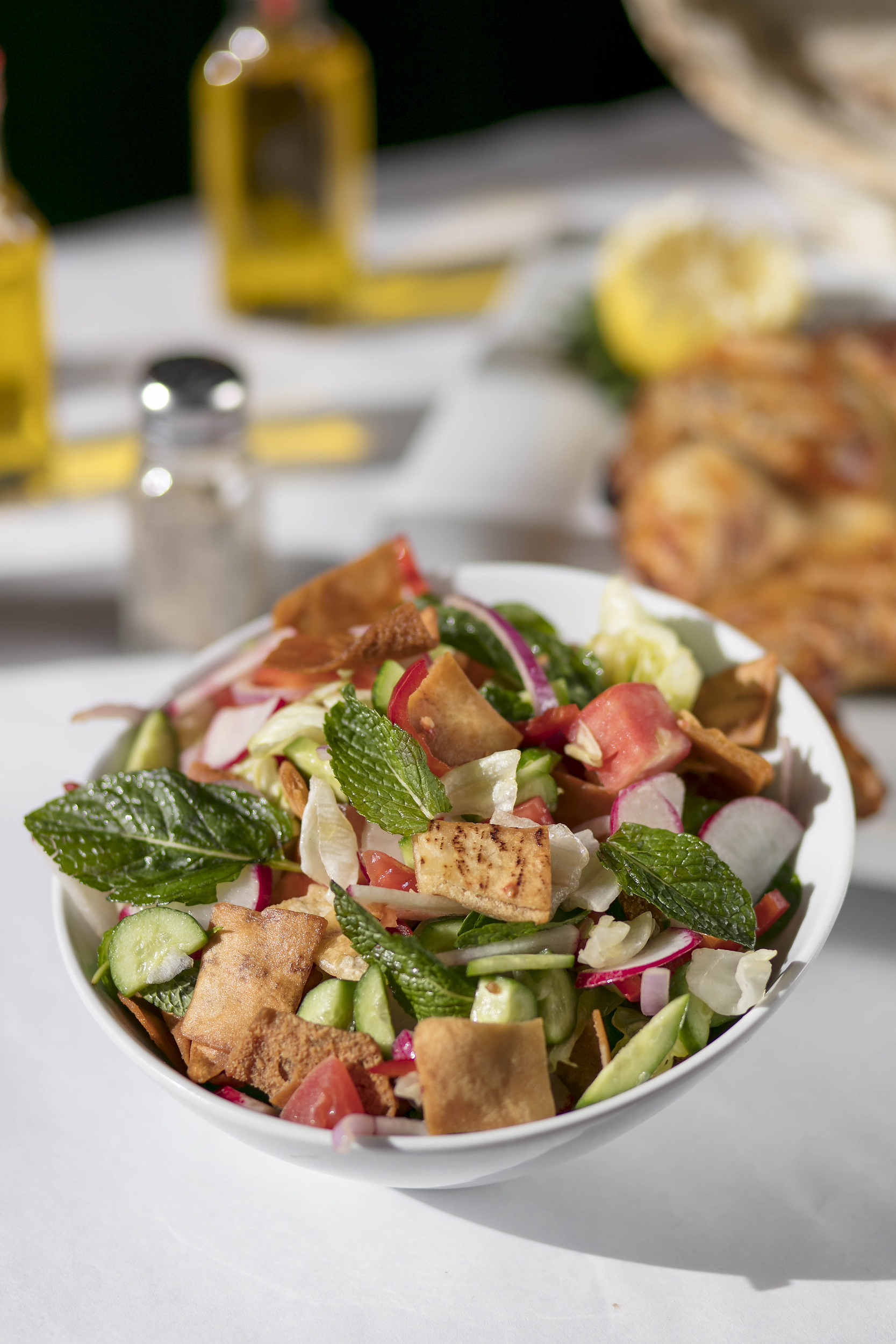Order Fattoush Salad food online from "AKKAD Mediterranean & Iraqi Grill " store, Glendale on bringmethat.com