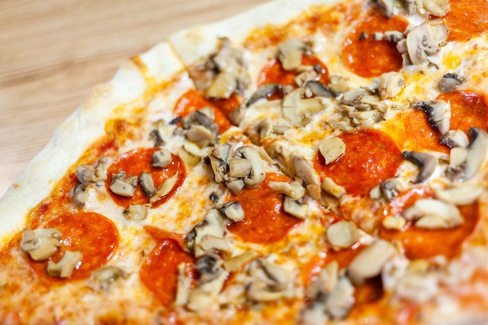 Order Two Toppings Pizza - Large 16" food online from Italian Pizzeria store, Durham on bringmethat.com