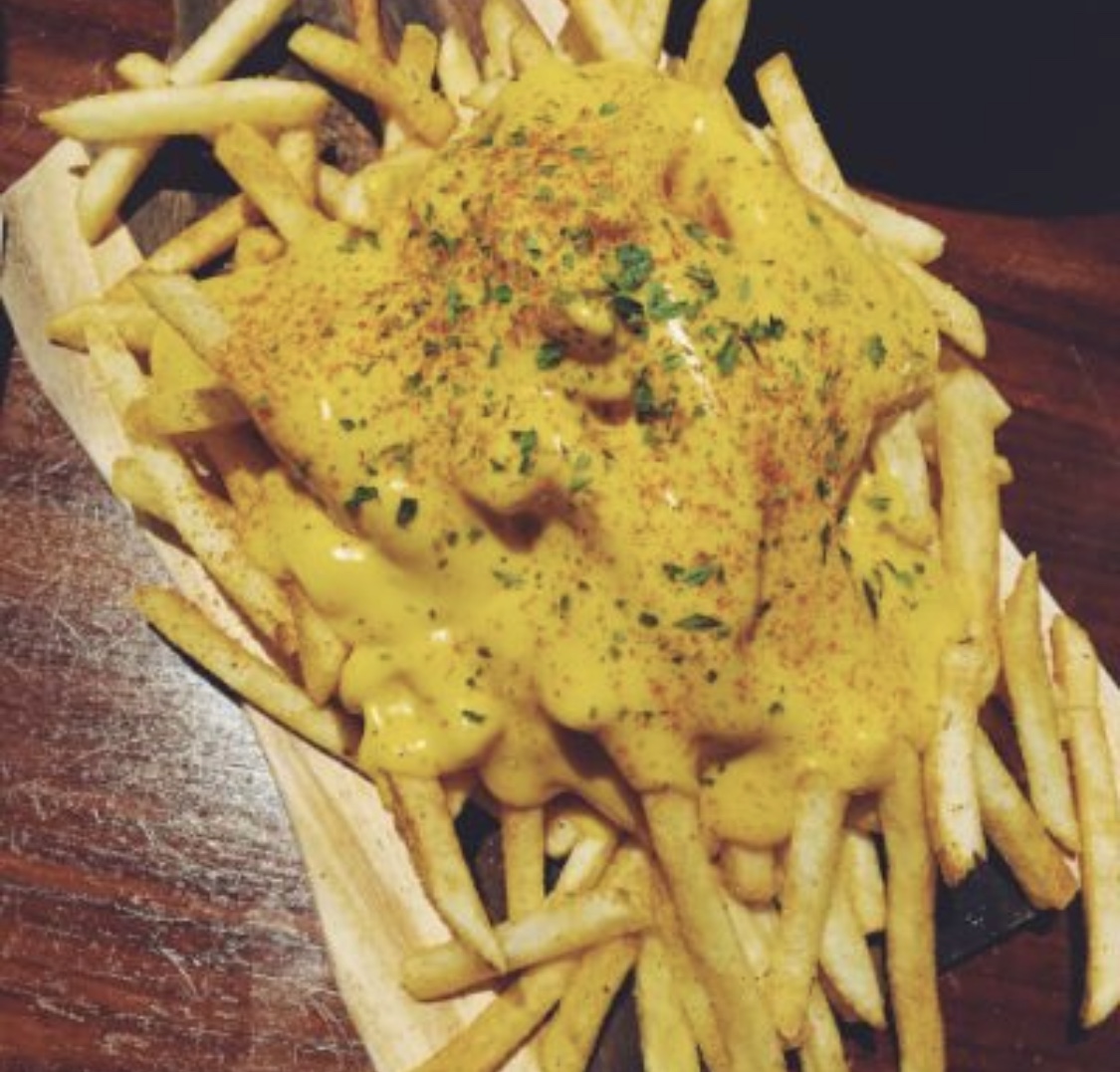 Order Crispy French Fries with Cheddar Cheese Sauce food online from Pizza Boli's store, Alexandria on bringmethat.com