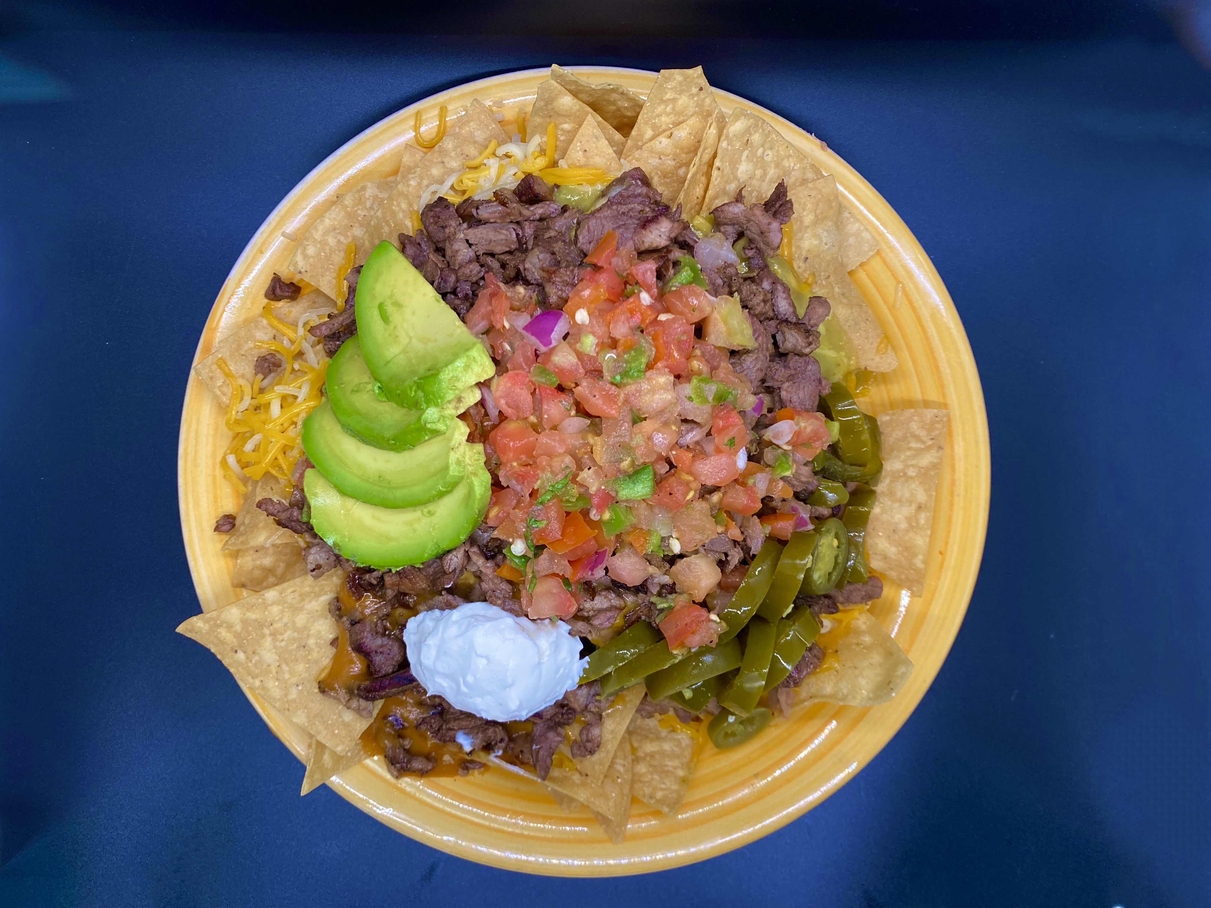 Order Nachos Supreme food online from The Workz store, Lancaster on bringmethat.com