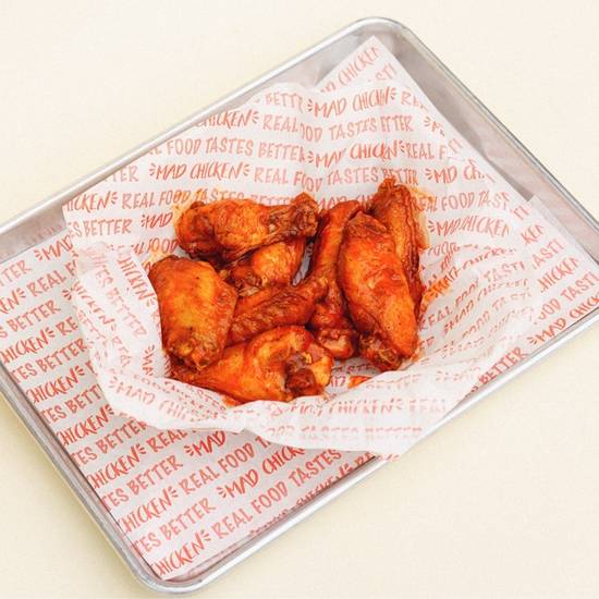 Order .8 TRADITIONAL WINGS * food online from Mad Chicken store, Milwaukee on bringmethat.com