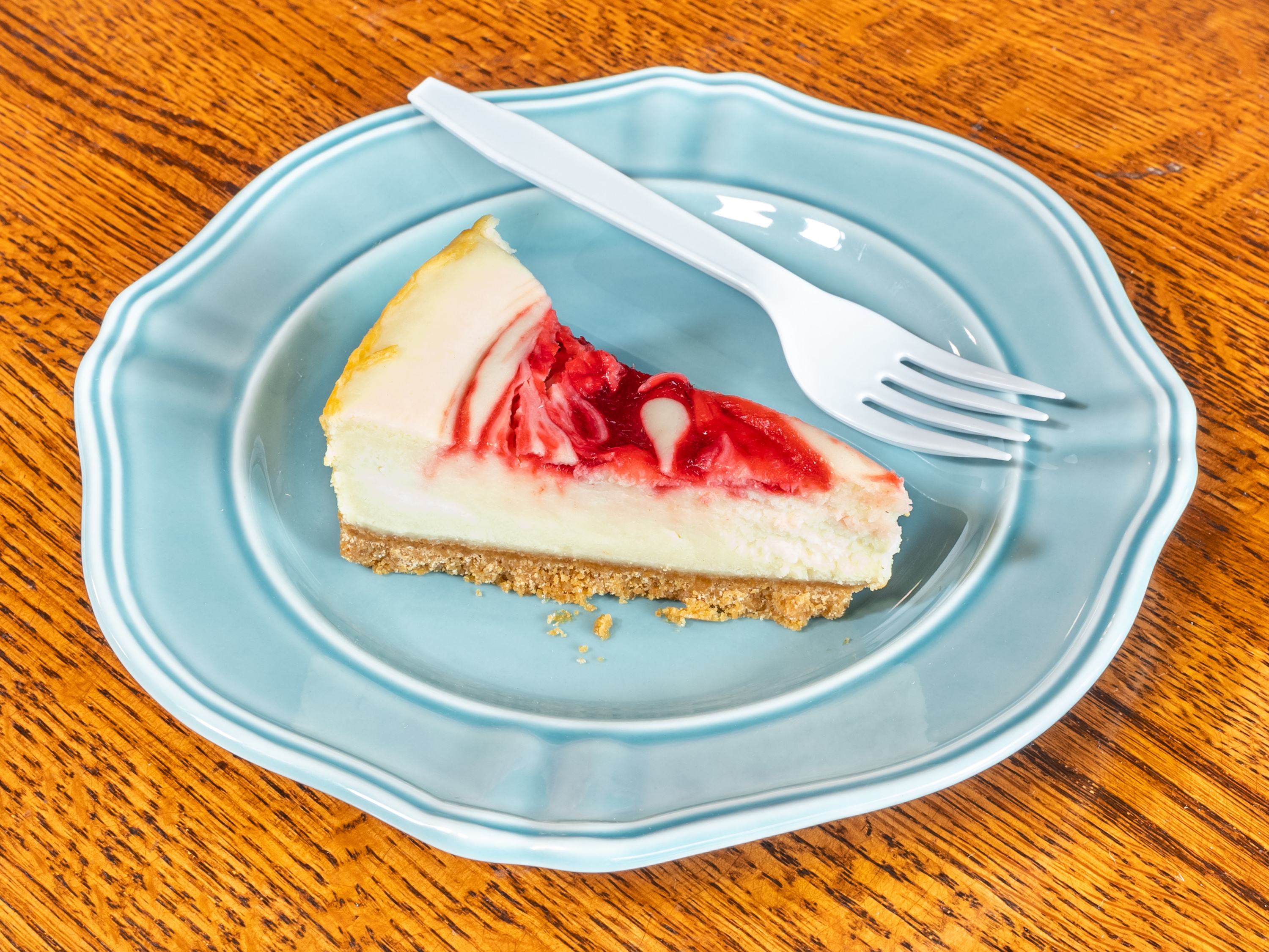 Order Strawberry Lace Cheesecake food online from Mama Mia's Pizza store, Denver on bringmethat.com