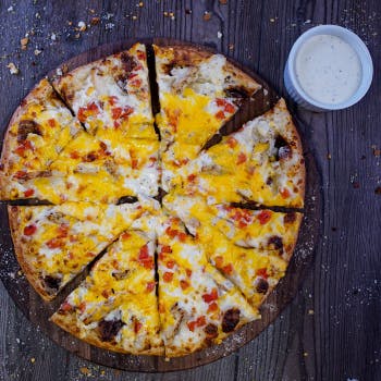Order Chicken Rancher Pizza - Medium (8 Slices) food online from Fox Pizza Den store, Bogart on bringmethat.com