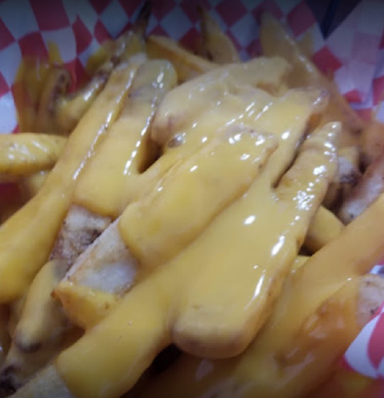 Order Cheesy Fries - Appetizer food online from Rico's Pizza store, Los Banos on bringmethat.com