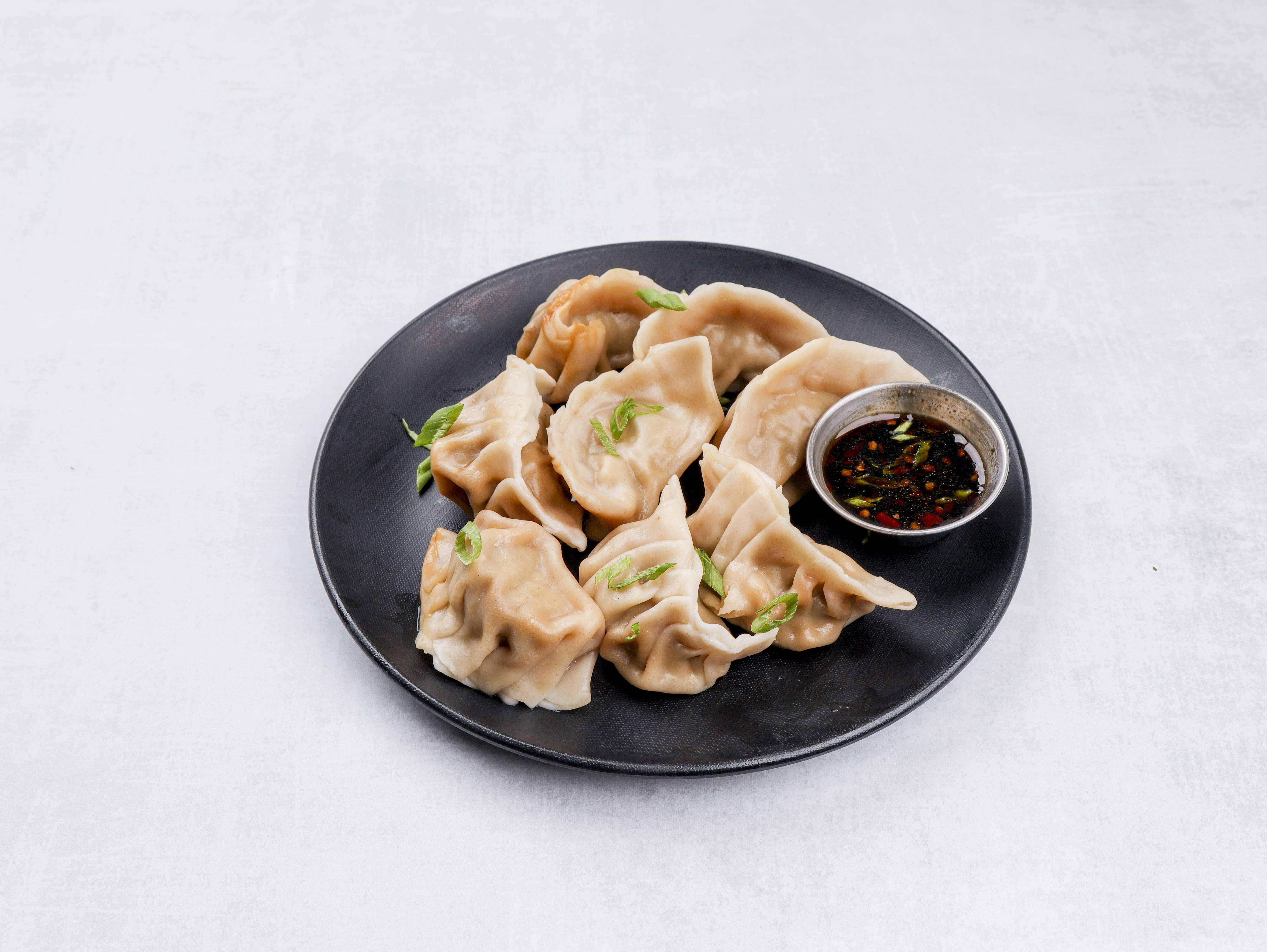 Order 10. Boiled Dumplings food online from Loon Sheng store, Columbia on bringmethat.com