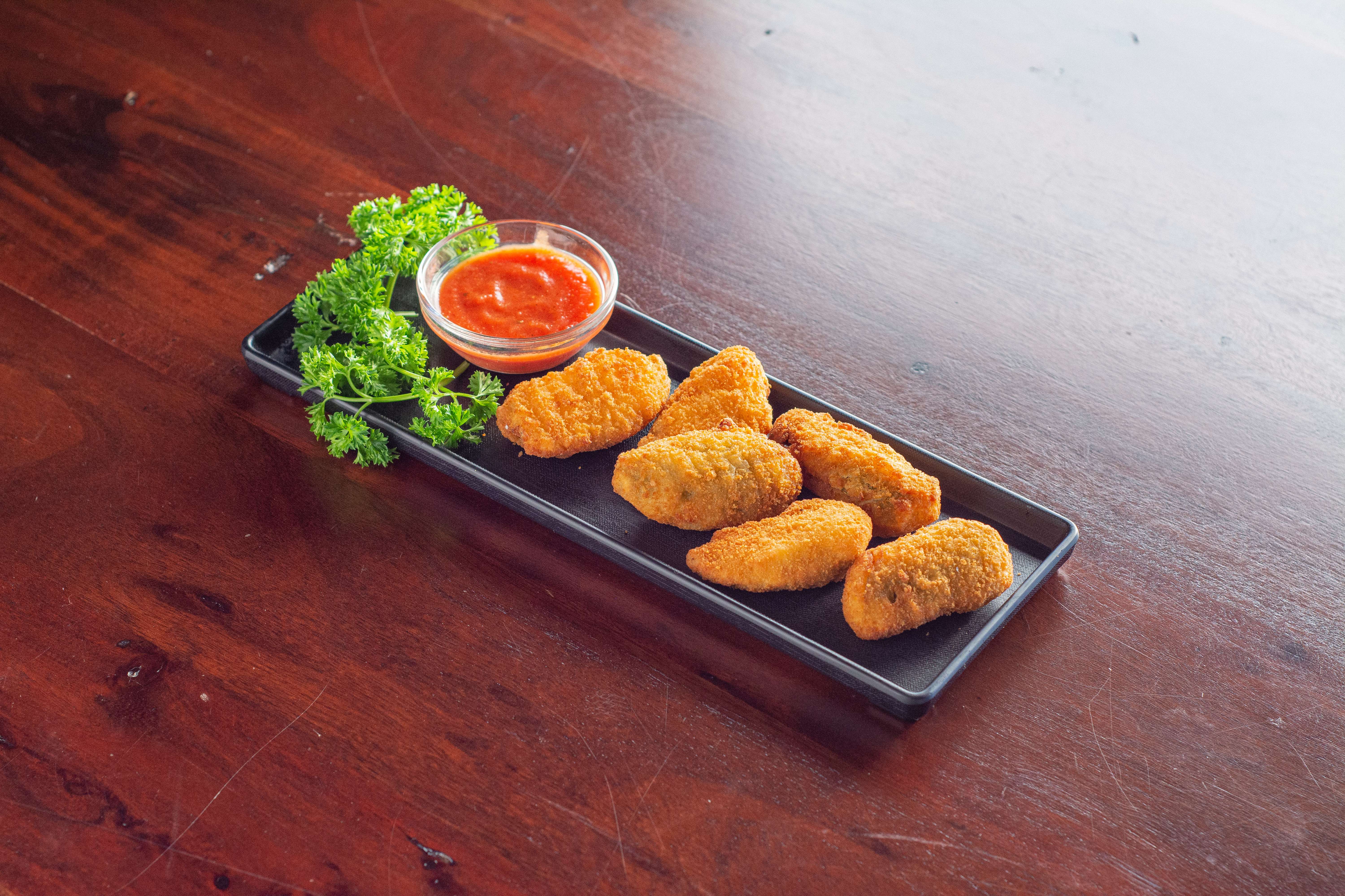 Order Jalapeno Poppers food online from San Fran Wings store, San Francisco on bringmethat.com