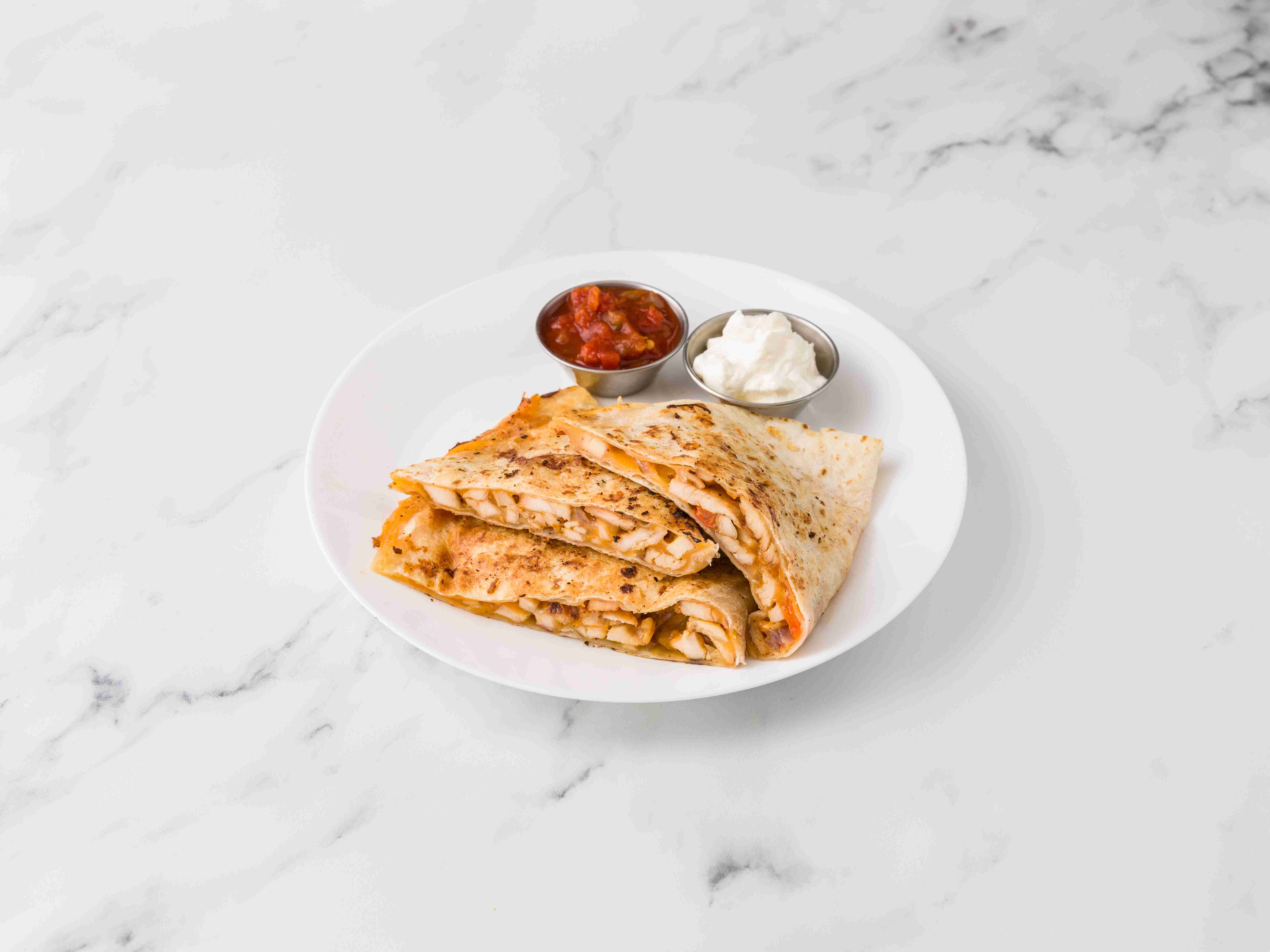 Order 3. Grilled Chicken Quesadilla food online from Empire gourmet deli store, New York on bringmethat.com