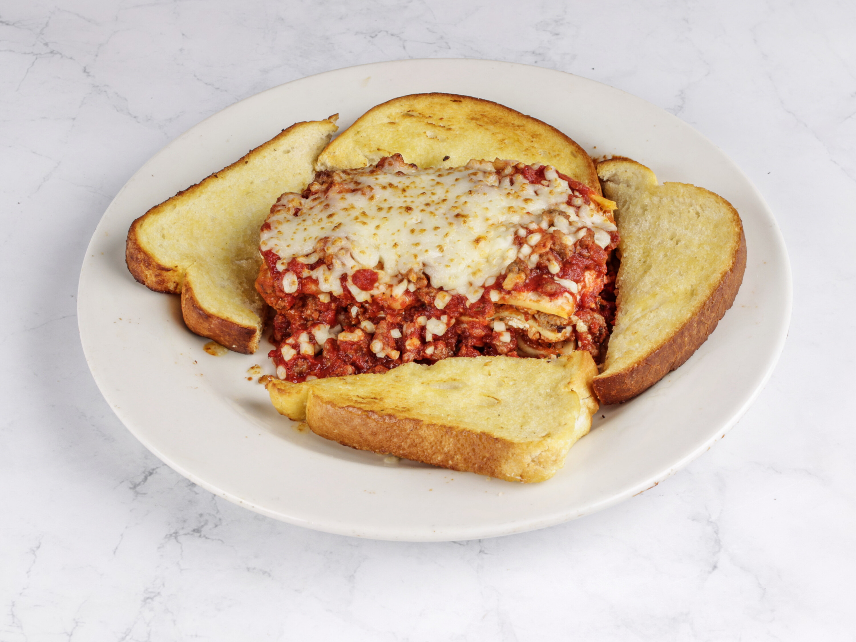 Order Sir Pizza's Favorite Lasagna Dinner food online from Sir Pizza store, Lexington on bringmethat.com
