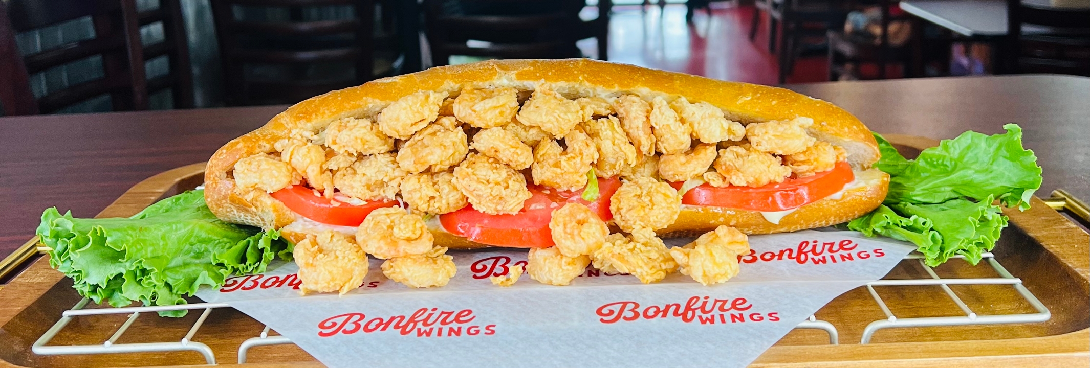 Order Shrimp Po-Boy food online from Bonfire Wings store, Houston on bringmethat.com