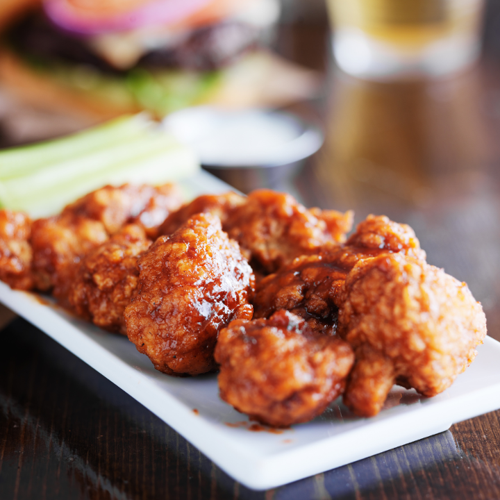 Order 6 Boneless Wings (1 Flavor Max) food online from First Down Sports Bar & Grill store, Arlington on bringmethat.com